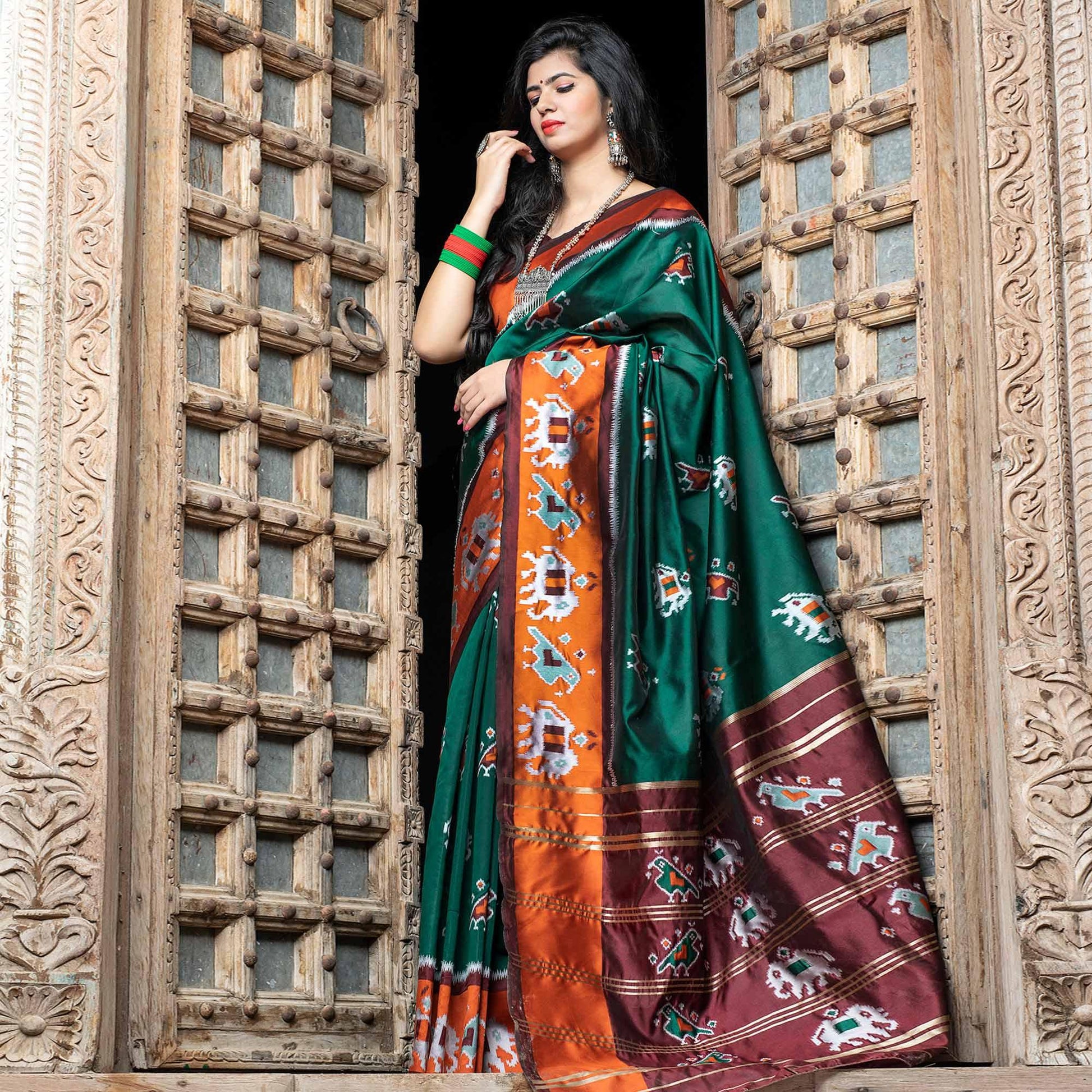 Fantastic Green Colored Festive Wear Woven Patola Silk Saree