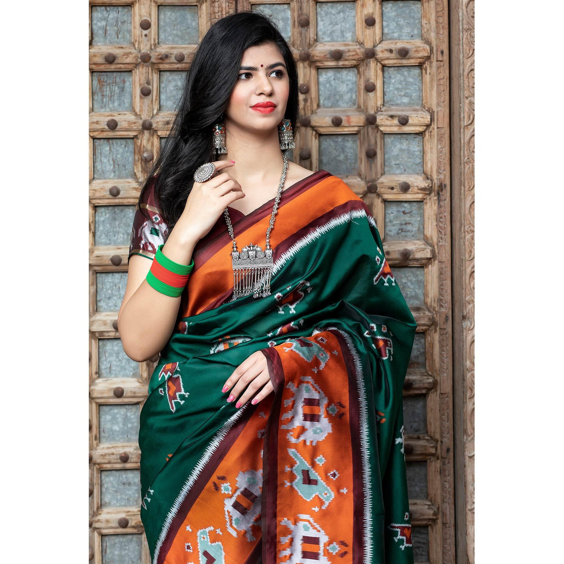 Fantastic Green Colored Festive Wear Woven Patola Silk Saree