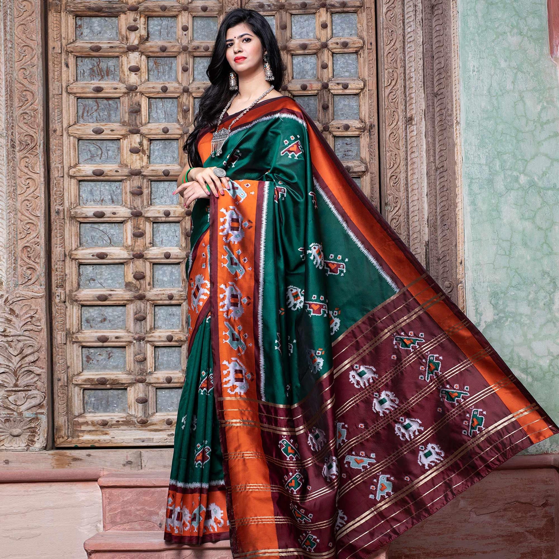 Fantastic Green Colored Festive Wear Woven Patola Silk Saree