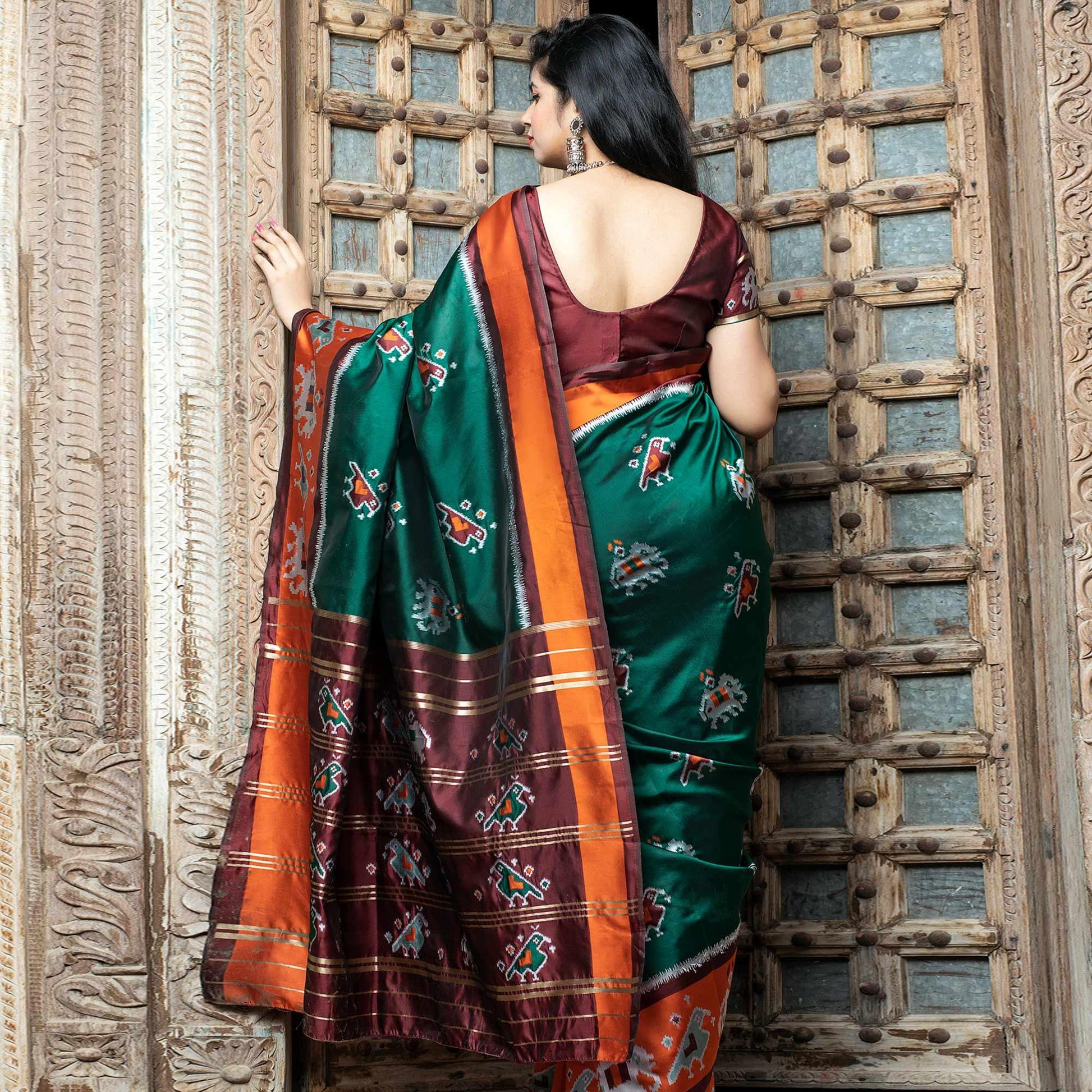 Fantastic Green Colored Festive Wear Woven Patola Silk Saree