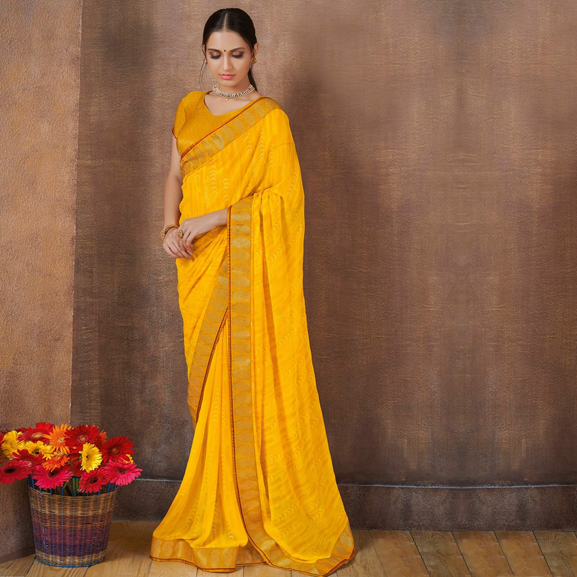 Fantastic Yellow Colored Festive Wear Foil Printed Georgette Saree
