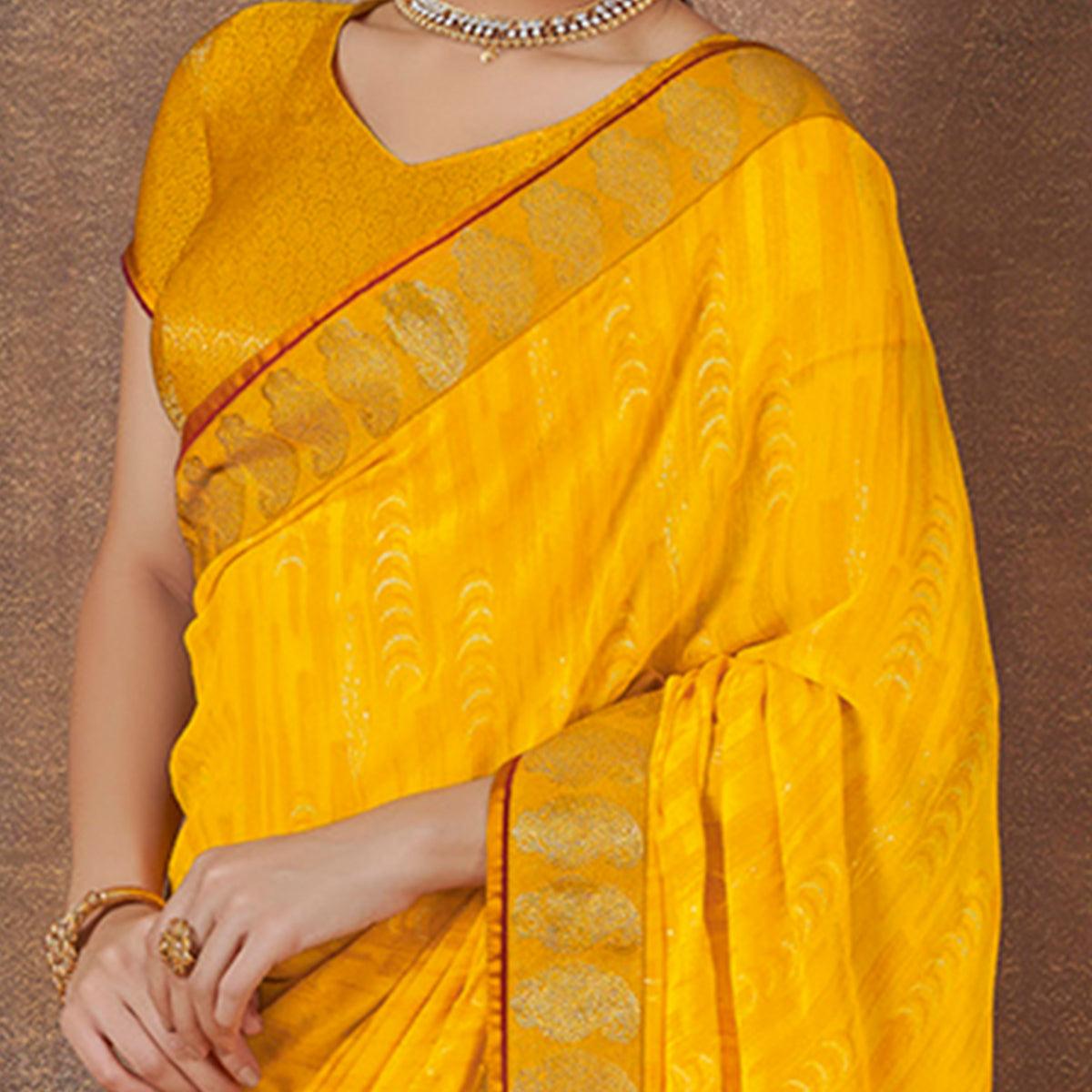 Fantastic Yellow Colored Festive Wear Foil Printed Georgette Saree