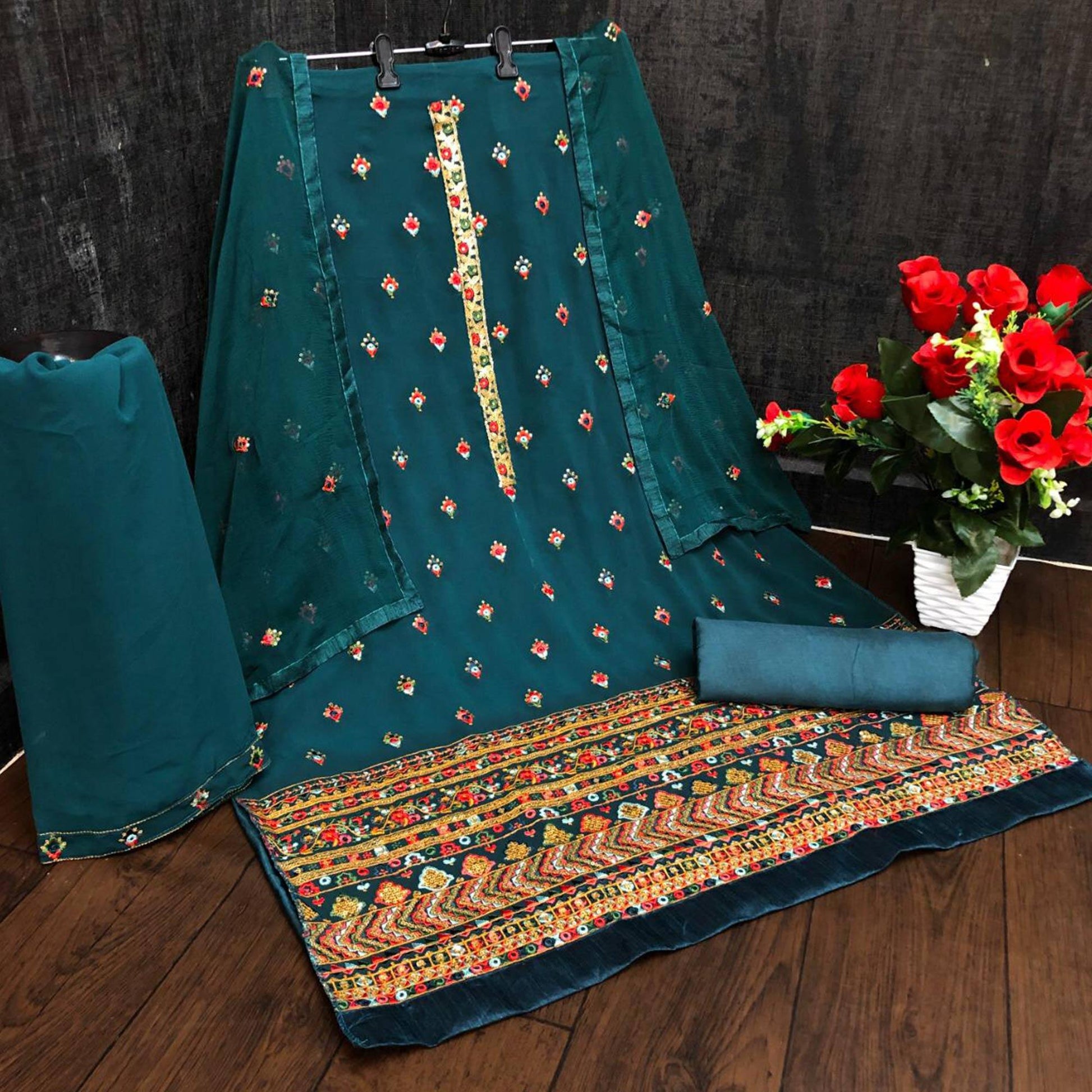 Festive Wear Sea Green Sequins Embroidery Work Faux Georgette Patiala Suit