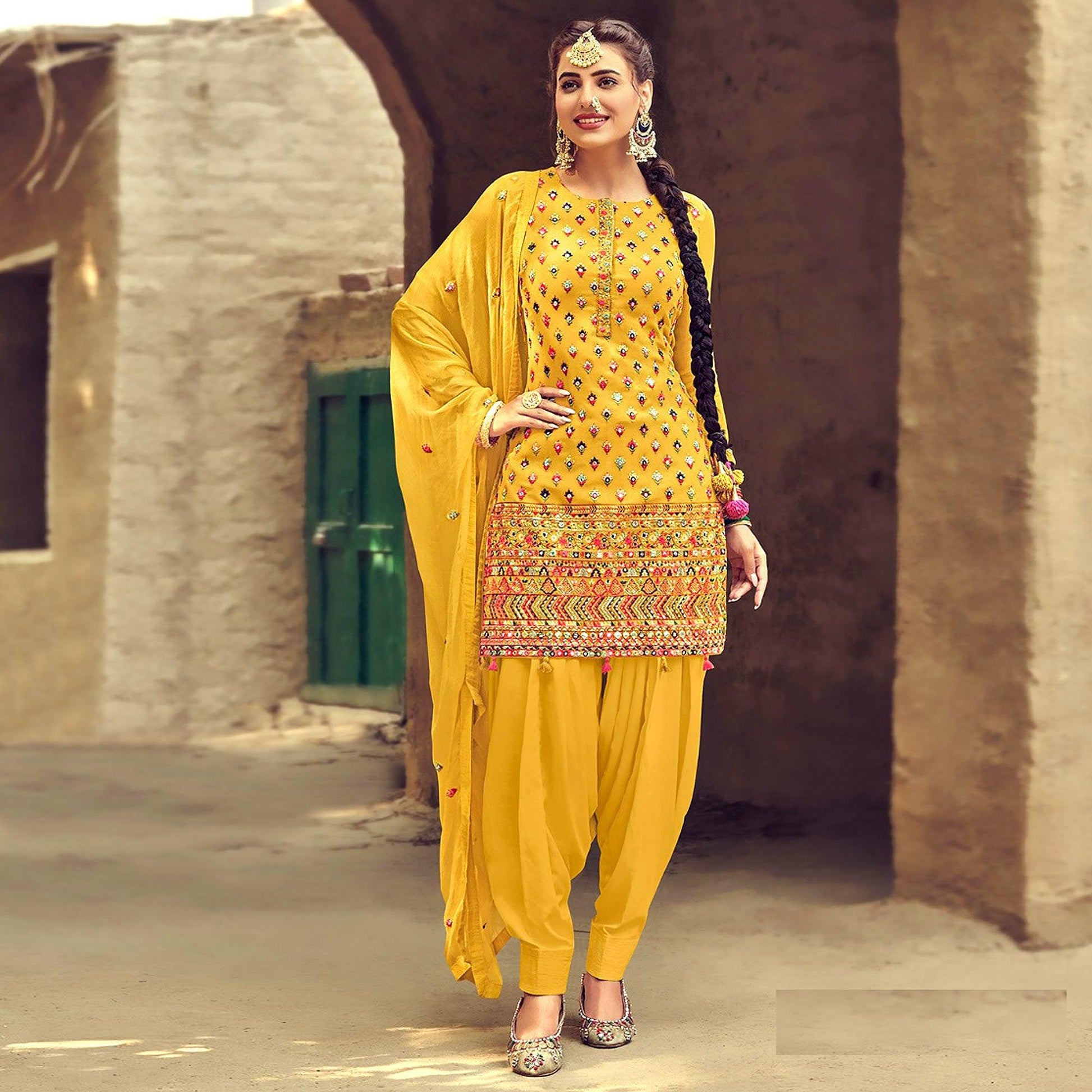 Festive Wear Yellow Sequins Embroidery Work Faux Georgette Patiala Suit