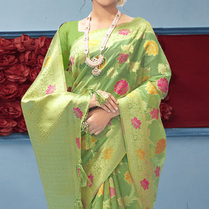 green-woven-organza-saree-with-tassels-1