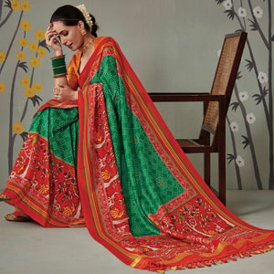 green-printed-patola-art-silk-saree-with-tassels