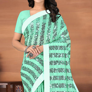 green-festive-wear-sequence-embroidered-georgette-saree-142832