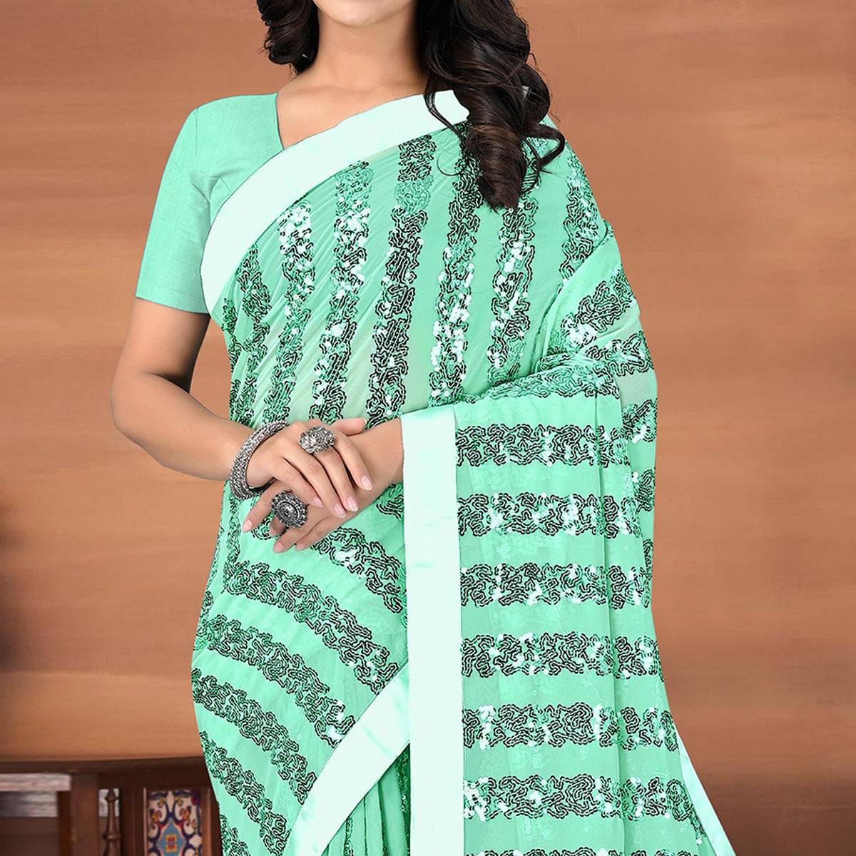green-festive-wear-sequence-embroidered-georgette-saree-142832