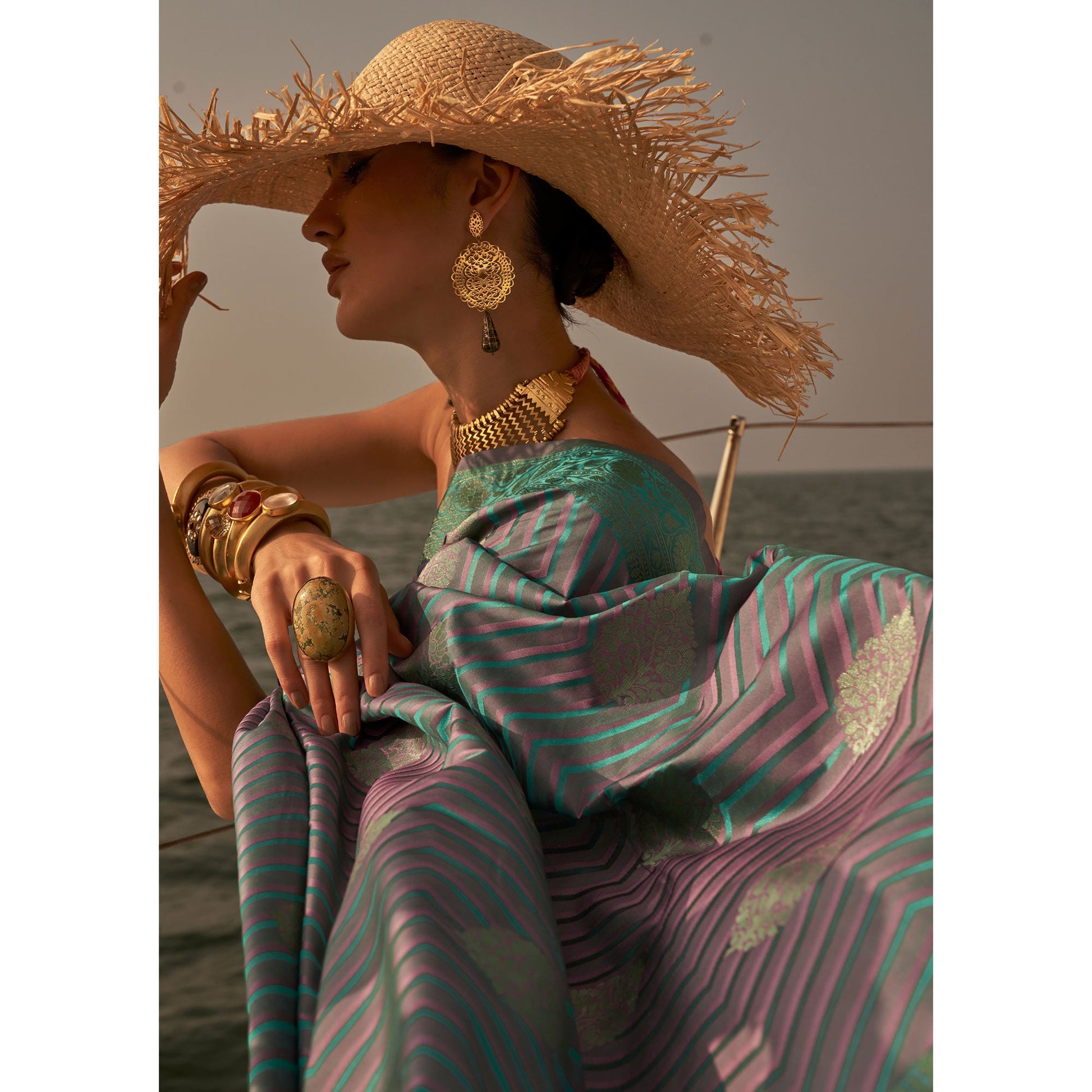 Mauve & Sea Green Woven Satin Saree With Tassels