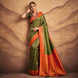 green-woven-art-silk-saree-with-tassels-1