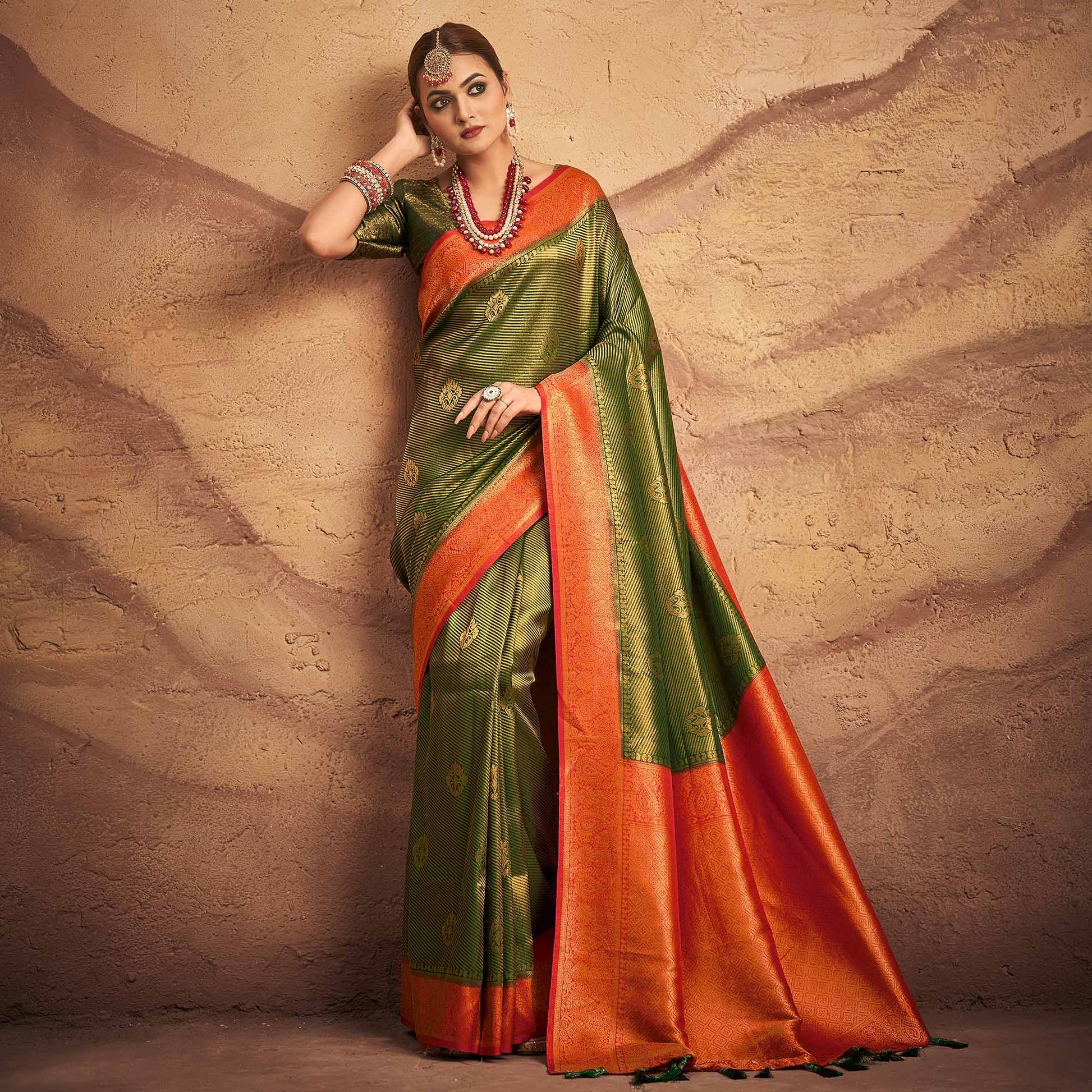 green-woven-art-silk-saree-with-tassels-1