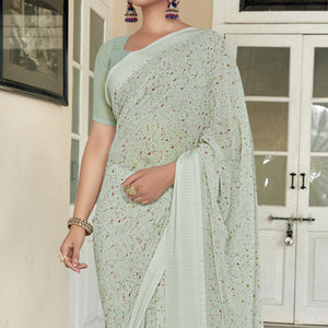 6green-printed-georgette-saree-with-checks-border