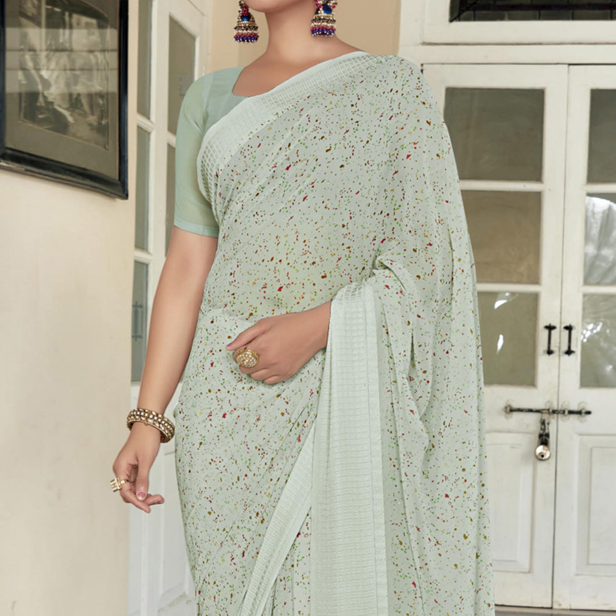 6green-printed-georgette-saree-with-checks-border