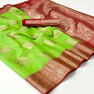 green-woven-linen-saree-with-tassels