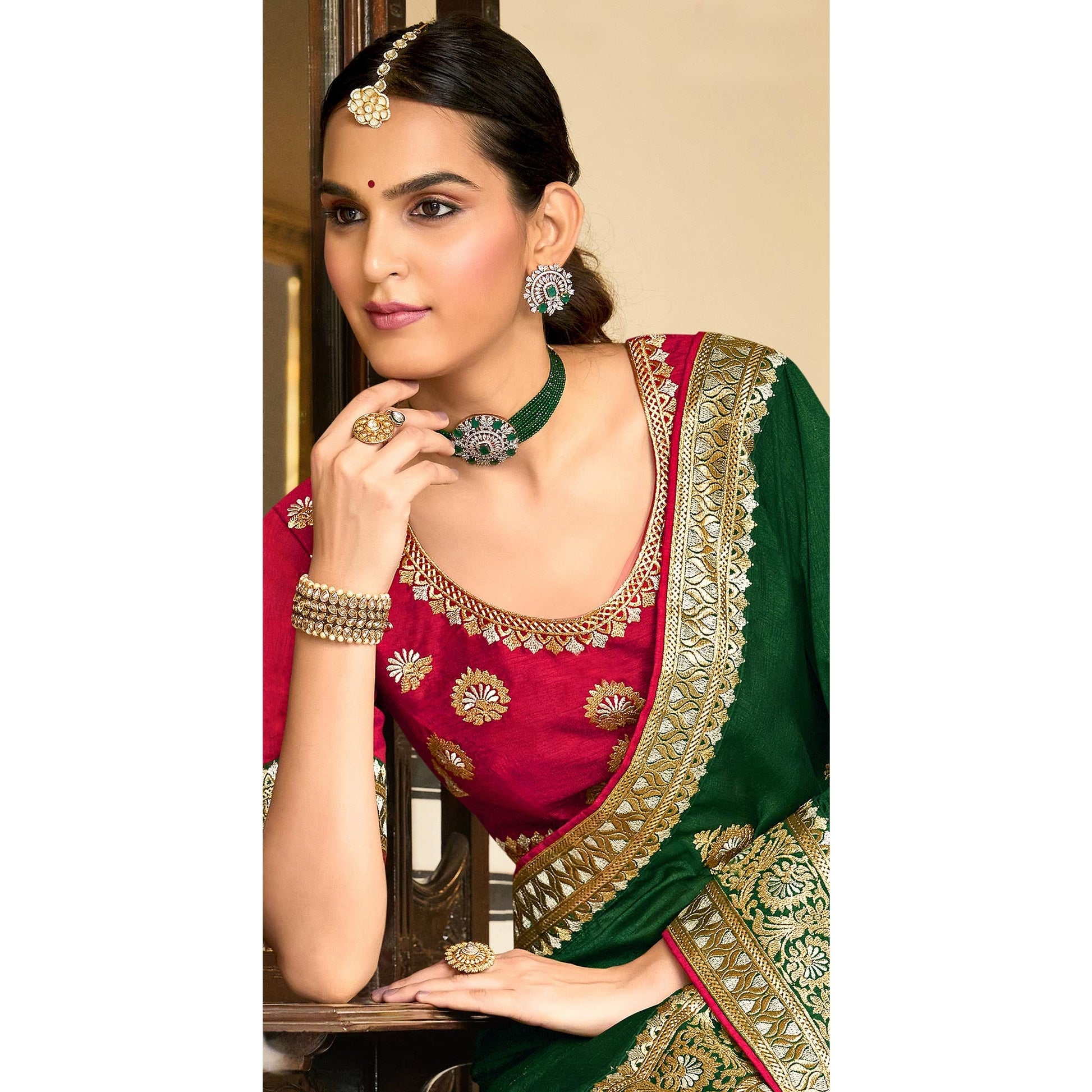 a-green-embroidered-vichitra-silk-saree-with-with-tassels