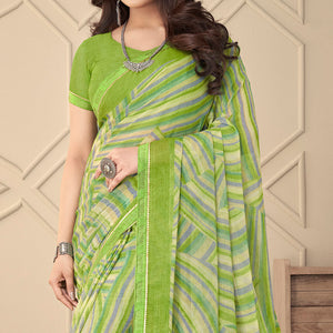green-printed-chiffon-saree-with-tassels-1