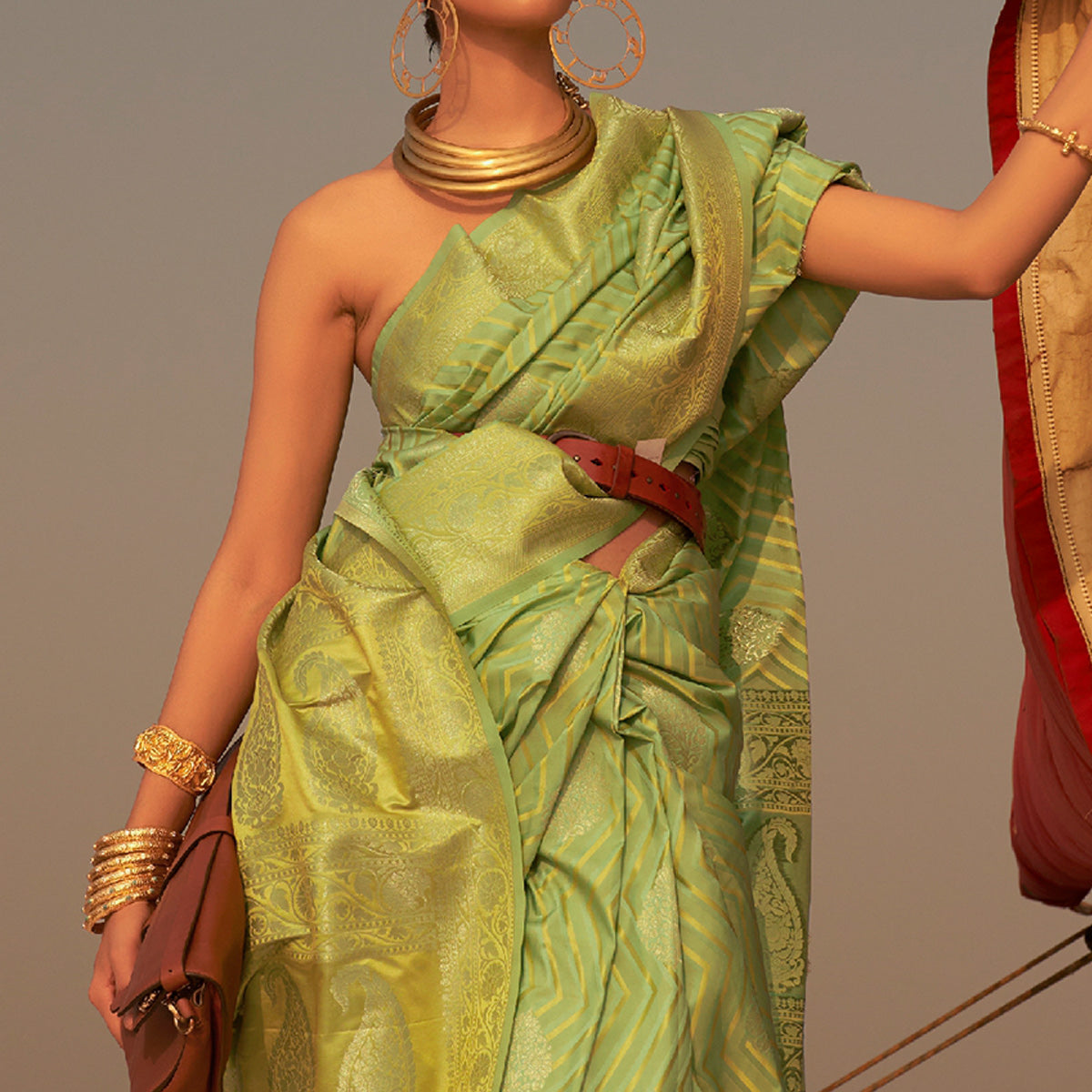 Mint Green Woven Satin Saree With Tassels