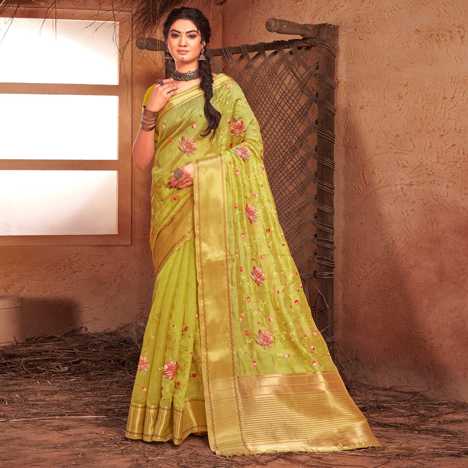 green-embroidered-with-woven-border-organza-saree
