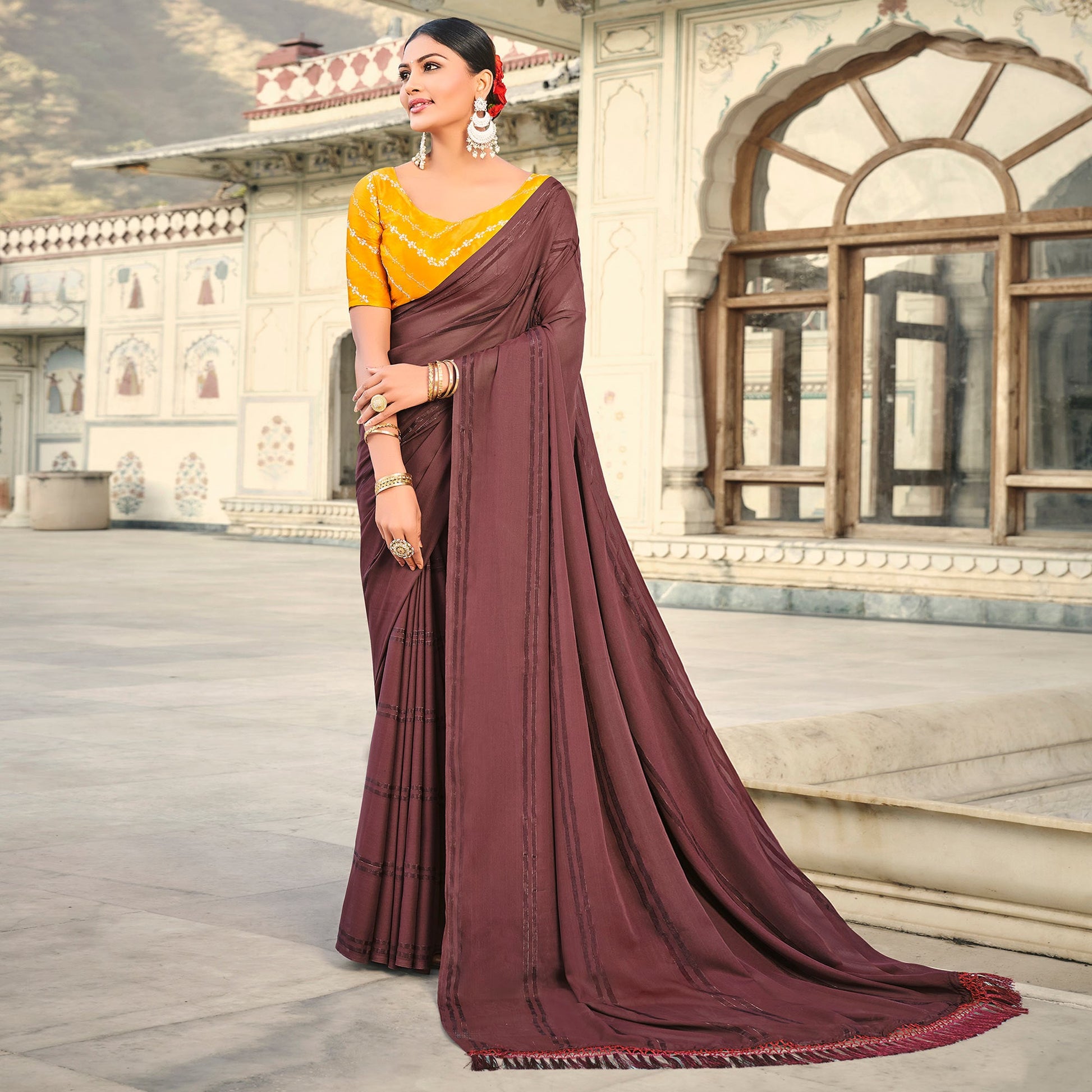 Brown Printed Georgette Saree With Tassels