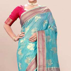 Blue Woven Organza Saree With Tassels