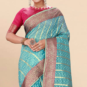 Blue Woven Organza Saree With Tassels