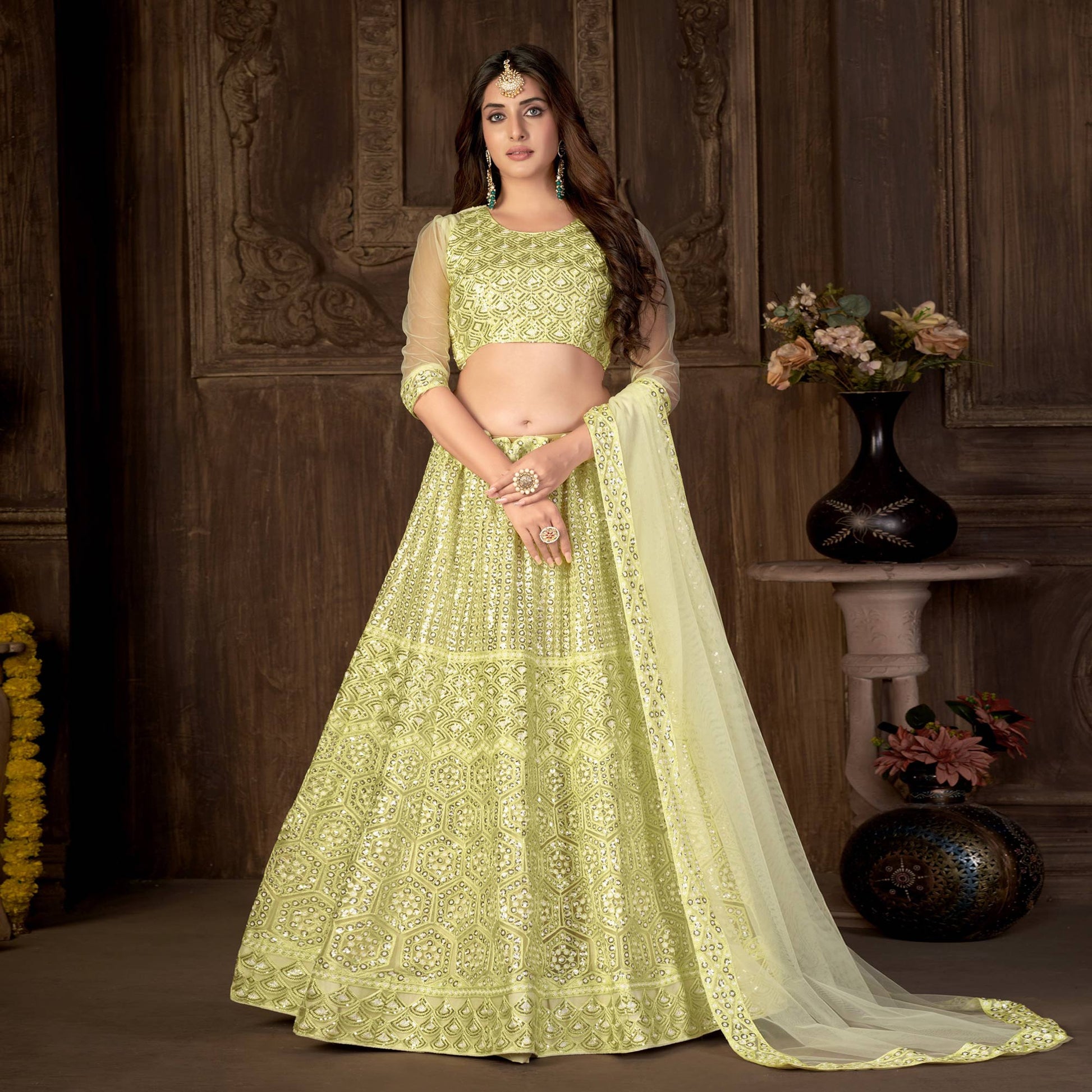 Lemon Yellow Sequins Embroidered Netted Lehenga Choli