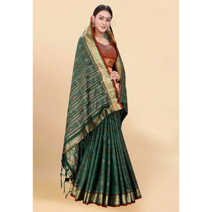 green-woven-patola-art-silk-saree-with-tassels-4