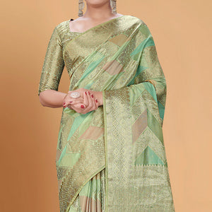 green-woven-organza-saree-with-tassels-12