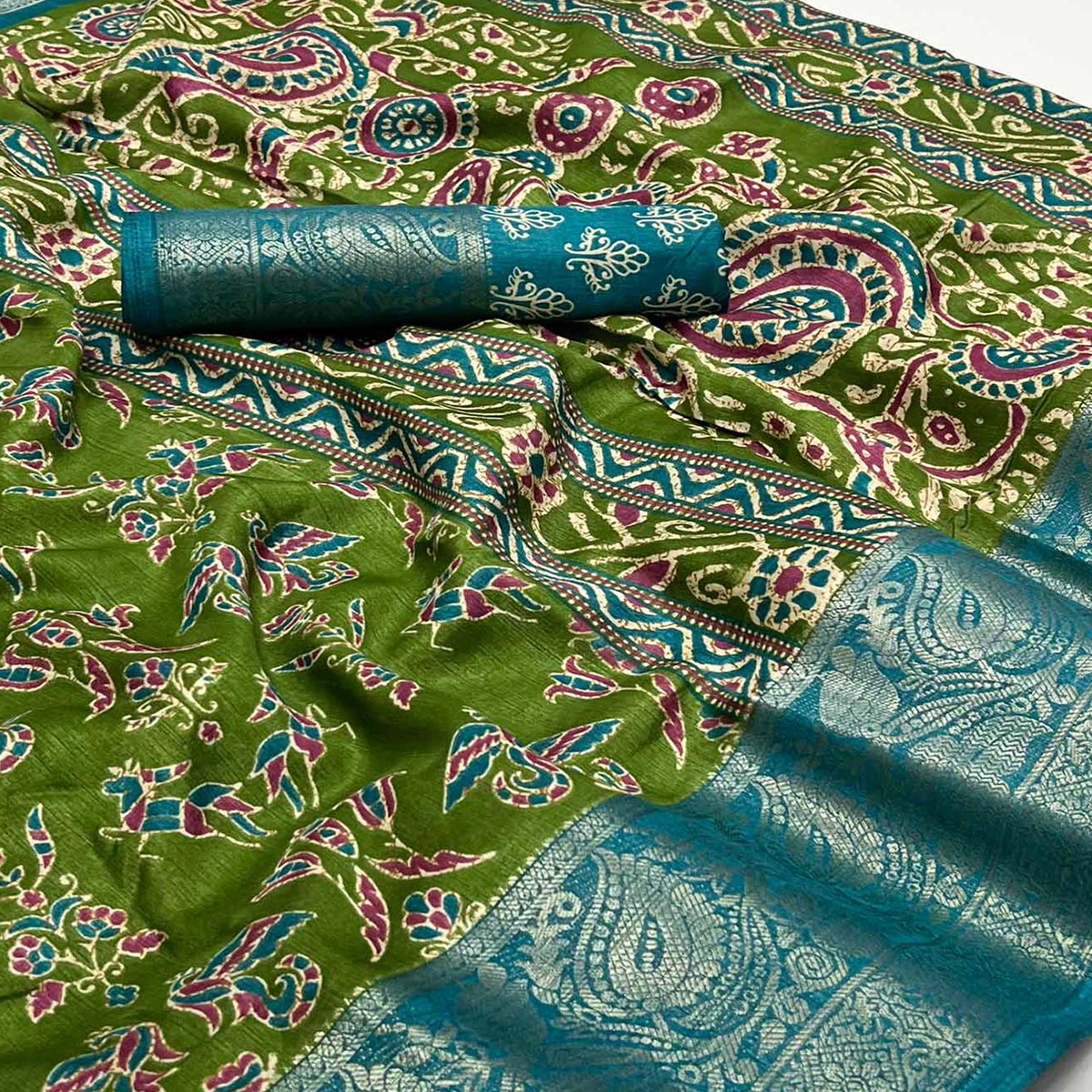 green-blue-printed-with-woven-border-dola-silk-saree