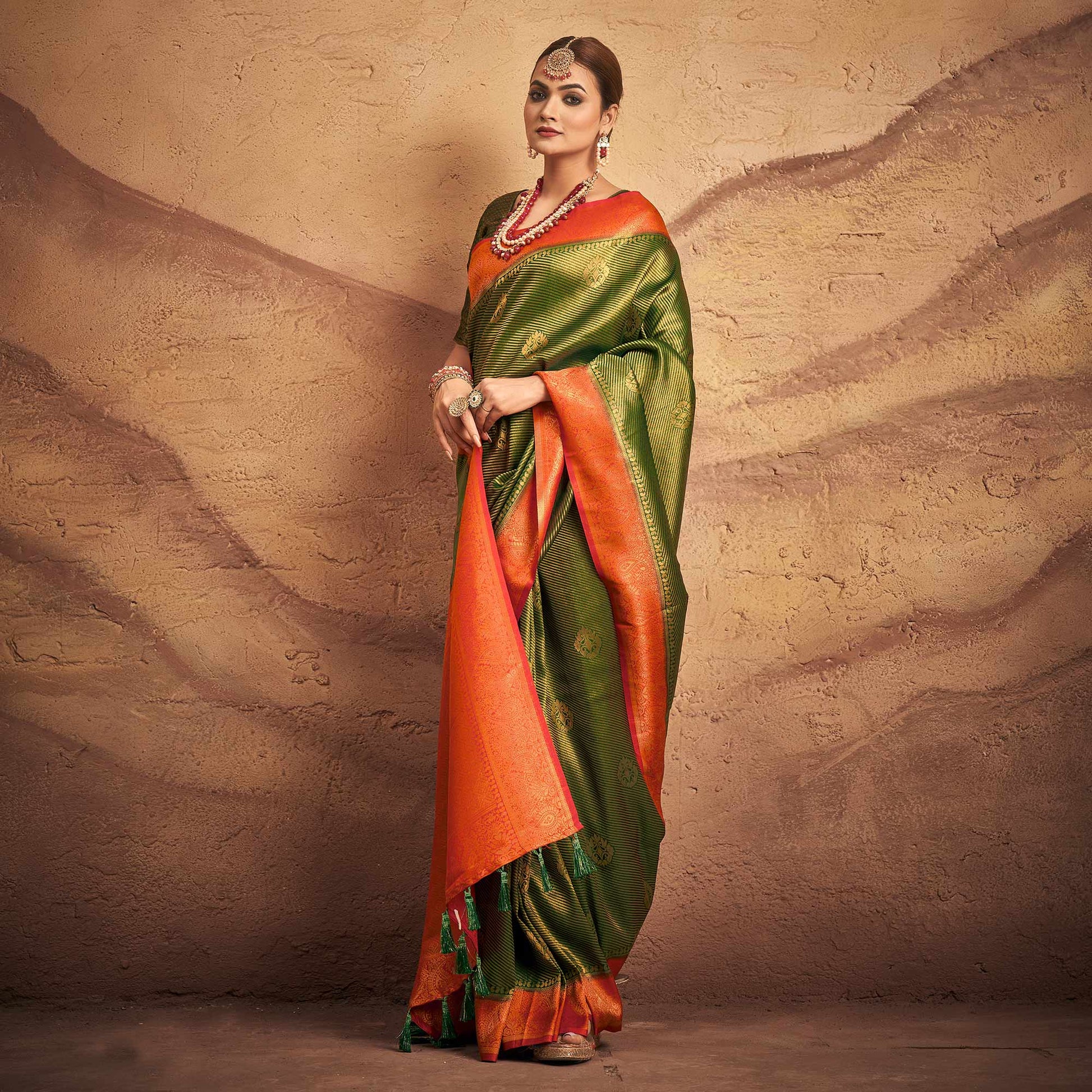 green-woven-art-silk-saree-with-tassels-1