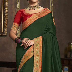 green-solid-with-woven-border-vichitra-silk-saree