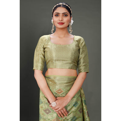 green-woven-organza-saree-with-tassels-11