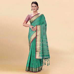green-woven-patola-art-silk-saree-with-tassels-3