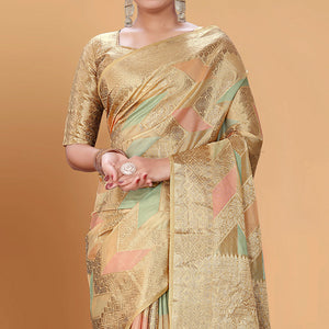 Chikoo Woven Organza Saree With Tassels