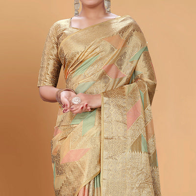 Chikoo Woven Organza Saree With Tassels