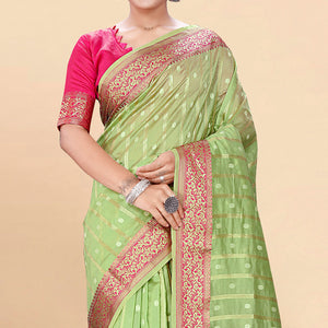 green-woven-organza-saree-with-tassels-18