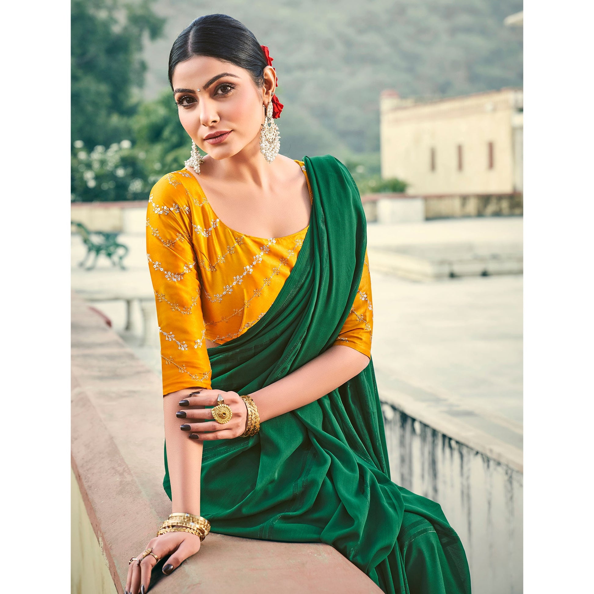 green-printed-georgette-saree-with-tassels-1