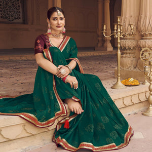 green-embellished-with-embroidered-border-satin-saree