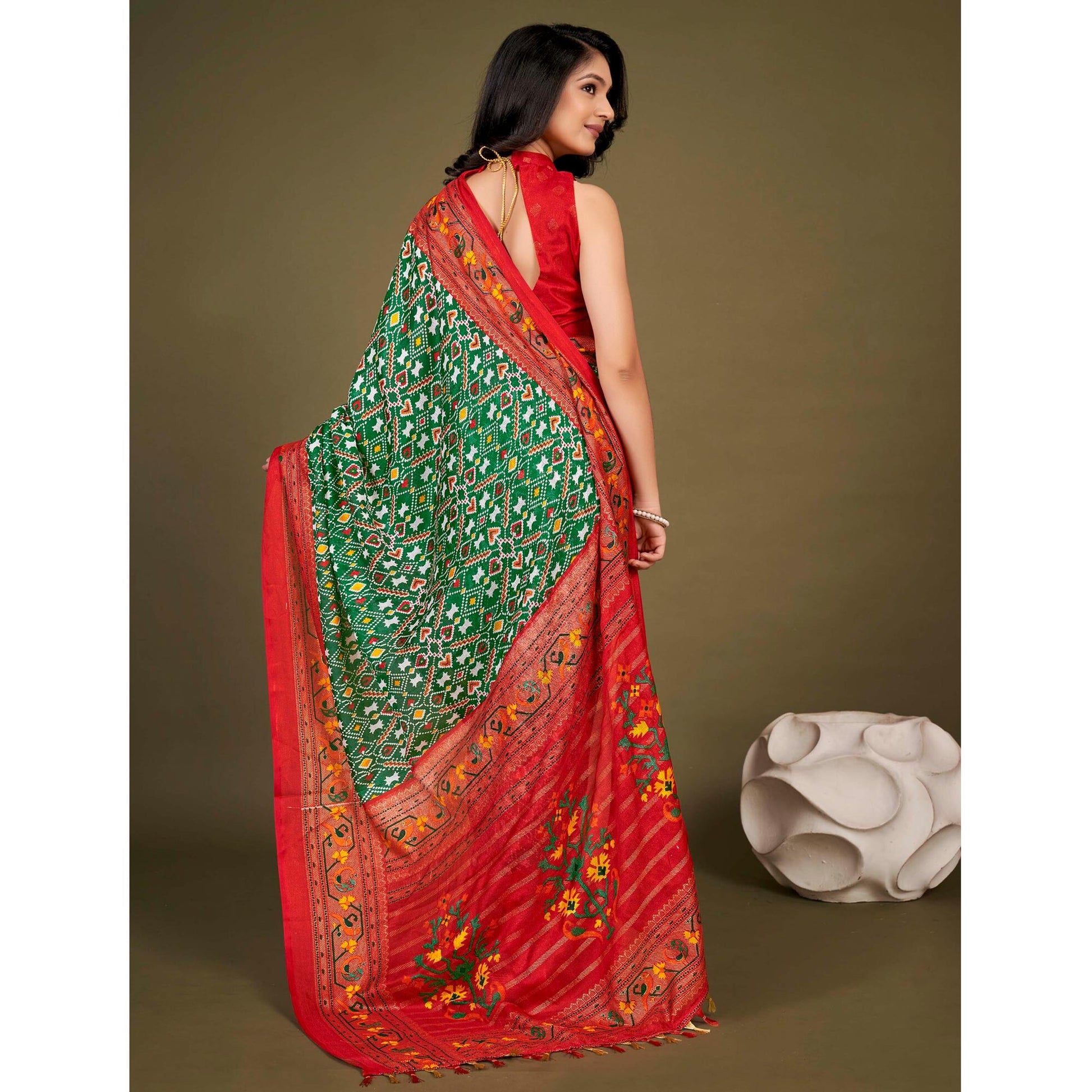 green-printed-jute-patola-saree-with-tassels-2