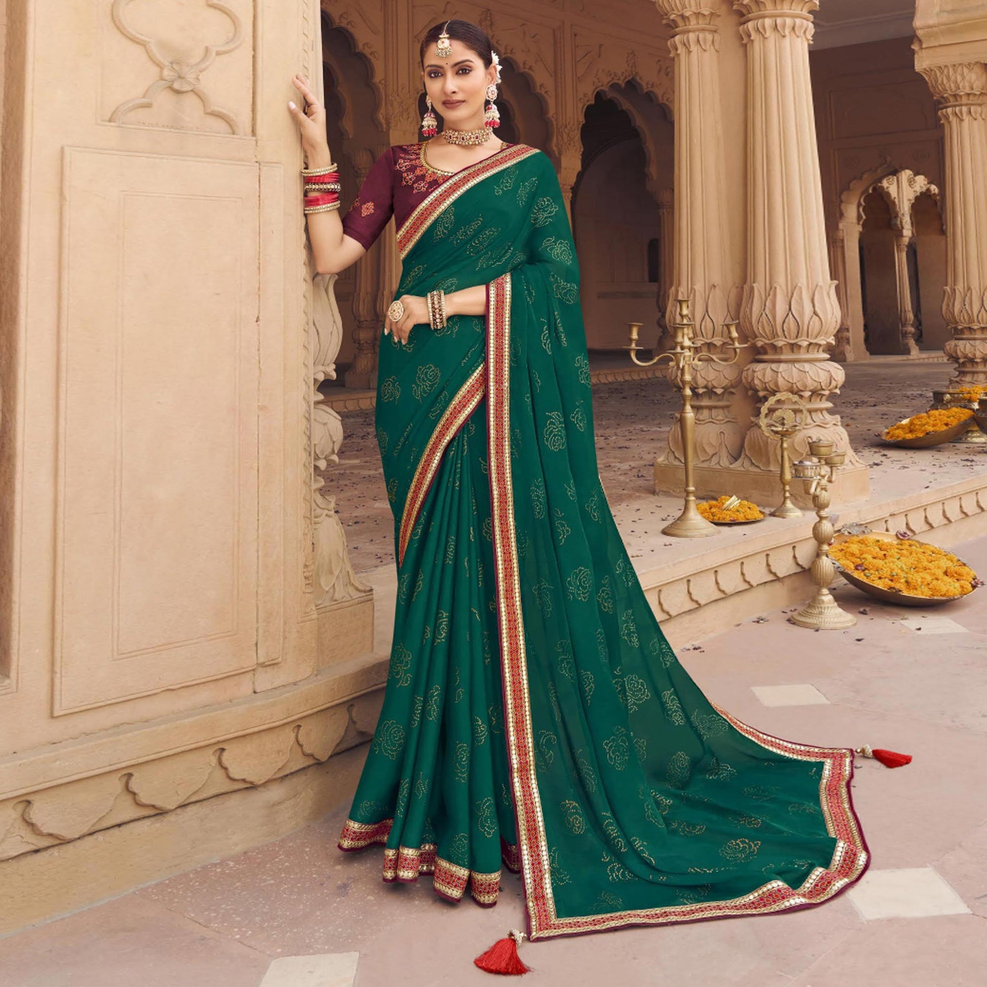 green-embellished-with-embroidered-border-satin-saree
