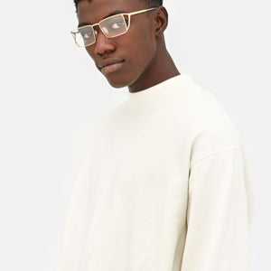 Numero 115 Oro