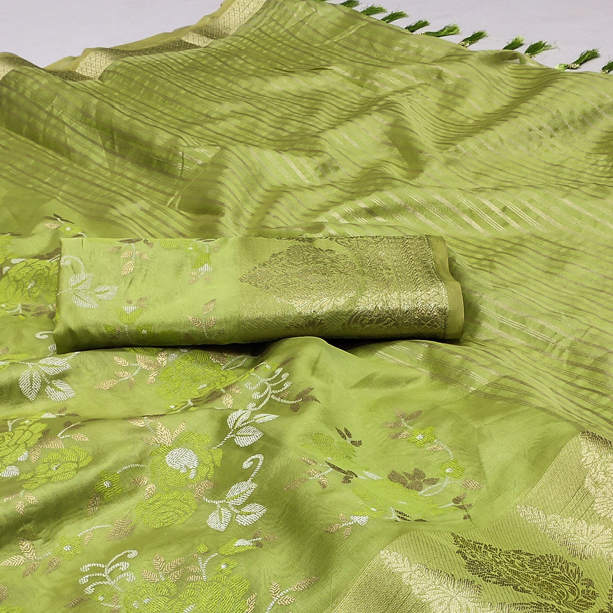 green-woven-organza-saree-with-tassels-5