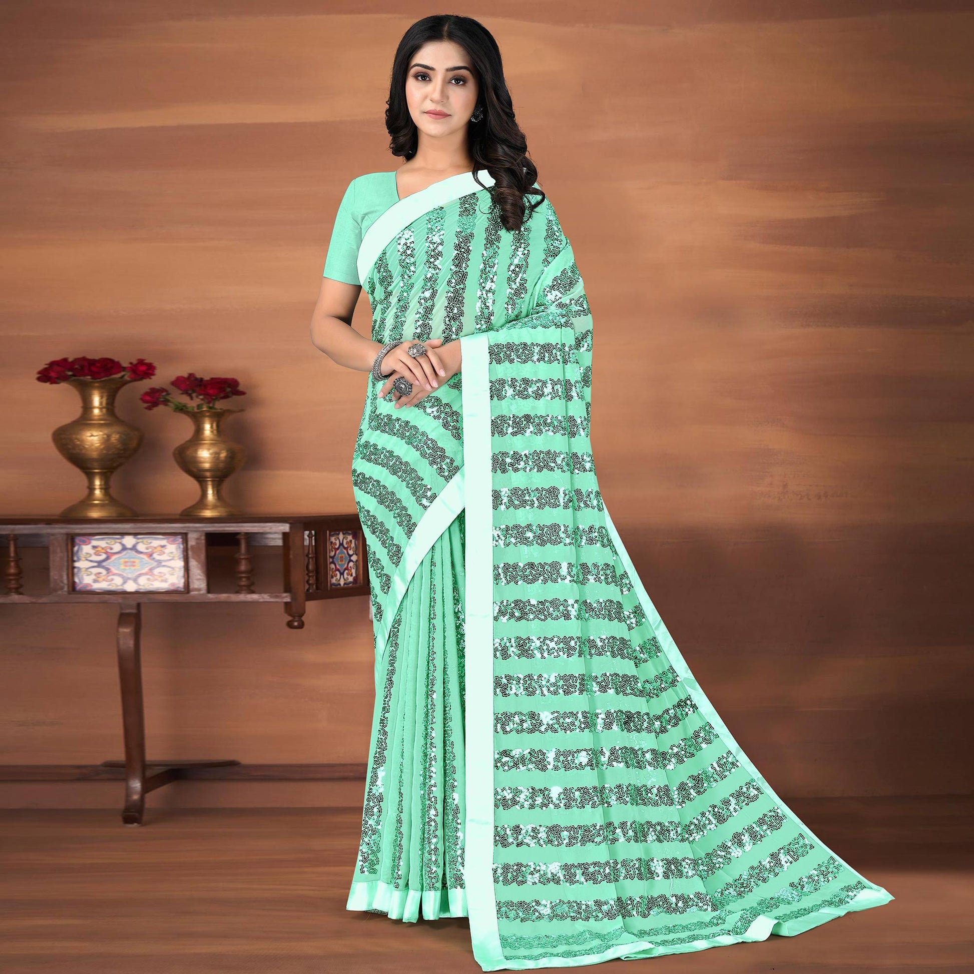 green-festive-wear-sequence-embroidered-georgette-saree-142832
