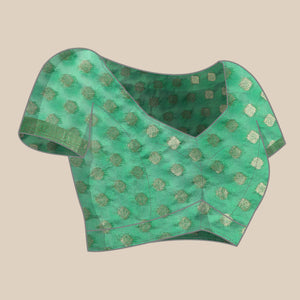 green-woven-organza-silk-saree-with-tassels