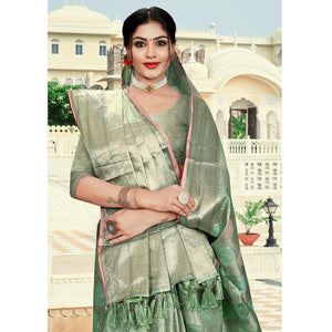 green-floral-woven-organza-saree-with-tassels