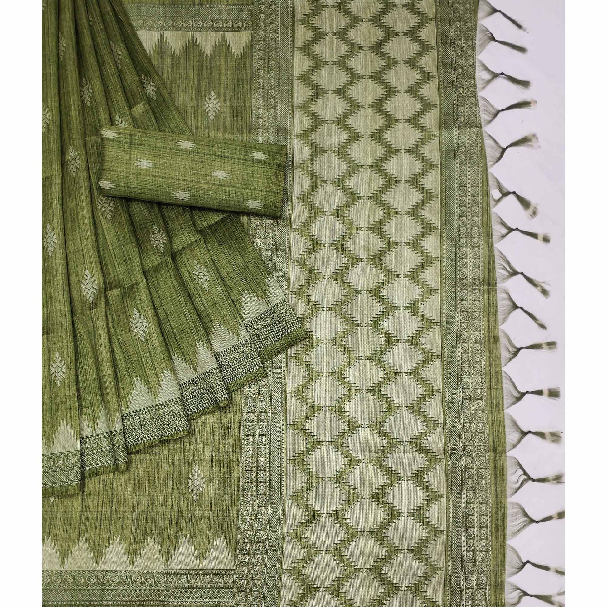 green-printed-tussar-silk-saree-with-tassels