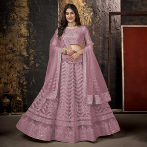 Mauve Heavy Embroidered Netted Lehenga Choli