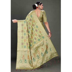 green-woven-organza-saree-with-tassels-11