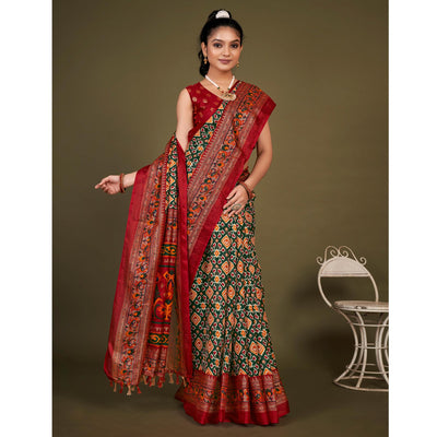 green-printed-jute-patola-saree-with-tassels-1
