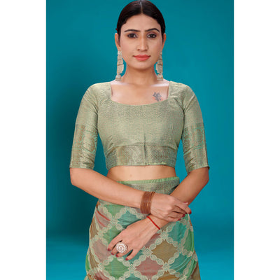 green-woven-organza-saree-with-tassels-16